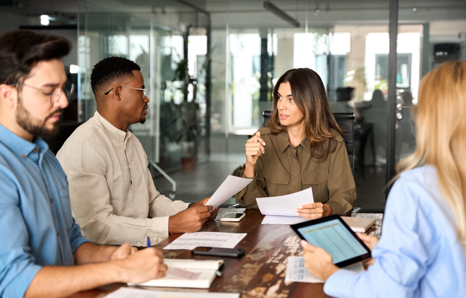 business execs at conference table