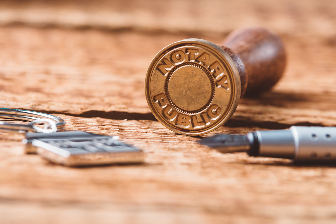 Notary public wax stamper on old wooden background